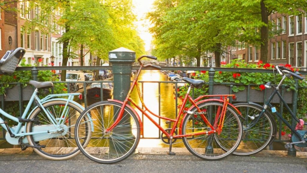 Sustainable Travel at Amsterdam, Netherlands: Famous for its cycling culture and green initiatives.